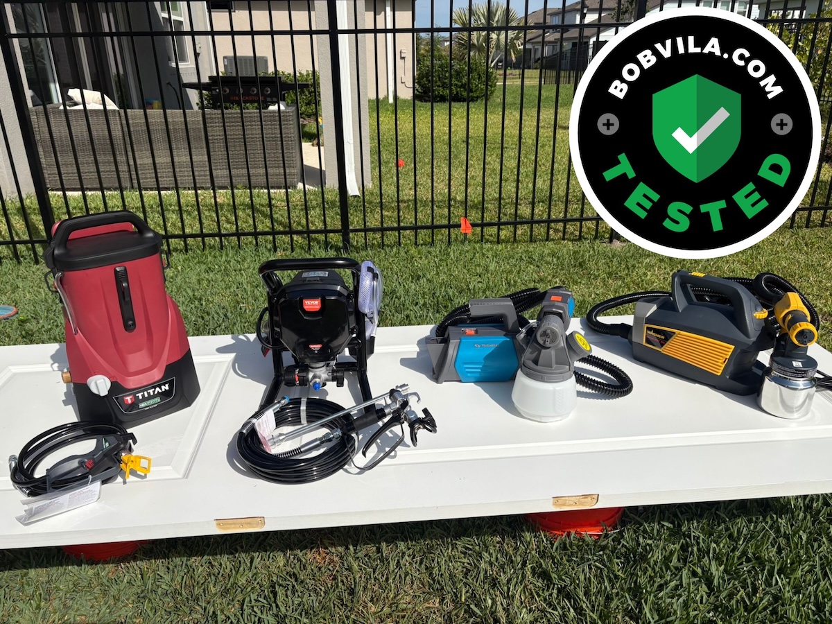 A group of the best paint sprayers for cabinets together on a horizontal panel door before testing