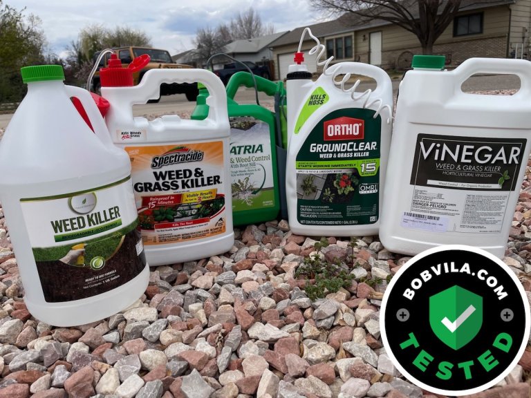 A group of the best weed killers for gravel on a gravel parking pad before testing