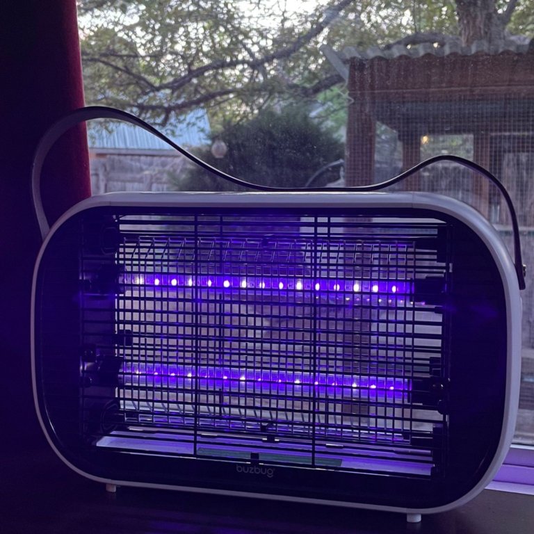 The Buzbug Rechargeable LED Bug Zapper on an indoor table during testing