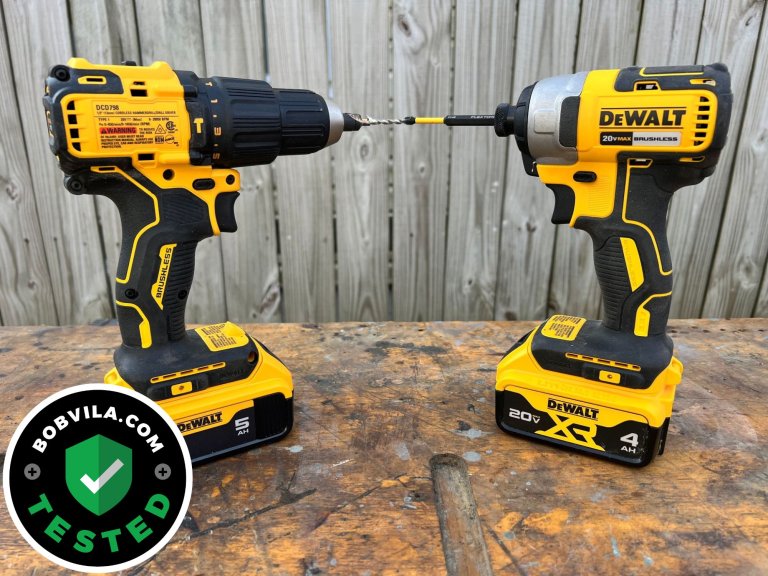 Two tools from the DeWalt 7-tool combo kit on a workbench before testing