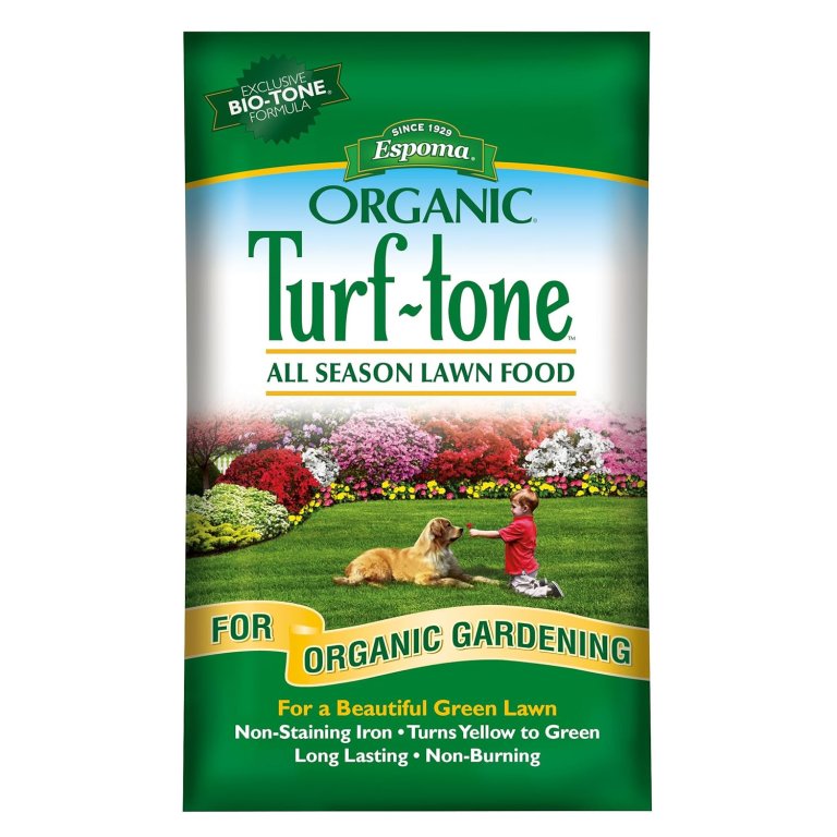 A bag of Espoma Turf Tone All Season Lawn Food on a white background