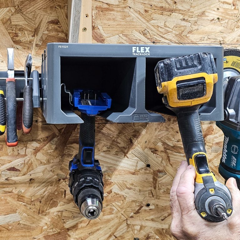 A product tester returning a drill to the FLEX Track-Lock Wall Storage System during testing