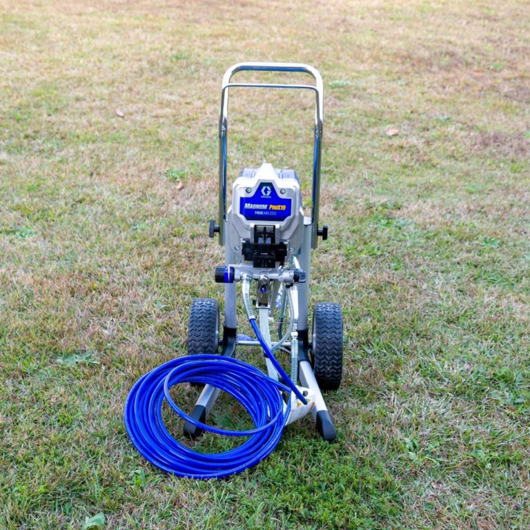 The Graco Magnum ProX19 Electric Paint Sprayer Cart outside before testing