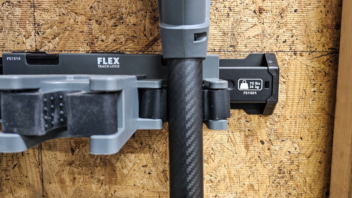 The FLEX storage system holding showing its 35 pound vertical storage