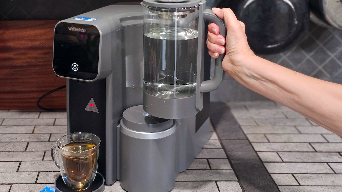 Removing the water pitcher from the Waterdrop M6H to put in the fridge