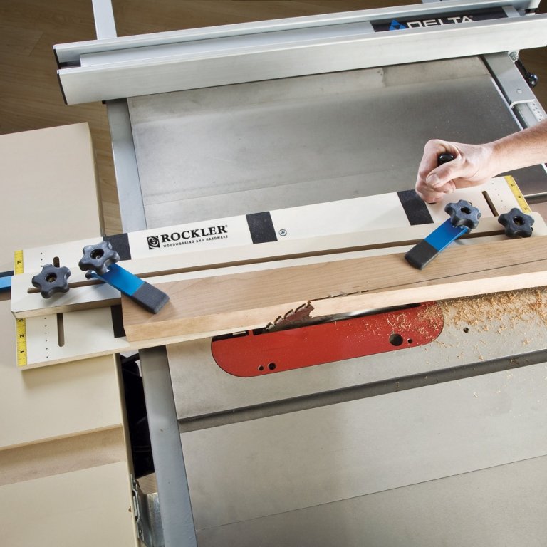 A person using a Rockler Taper Straight Line Jig as a straight-edge guide