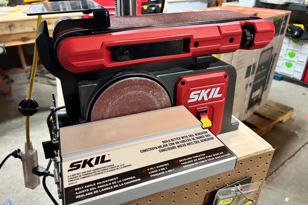Skil bench sander in use