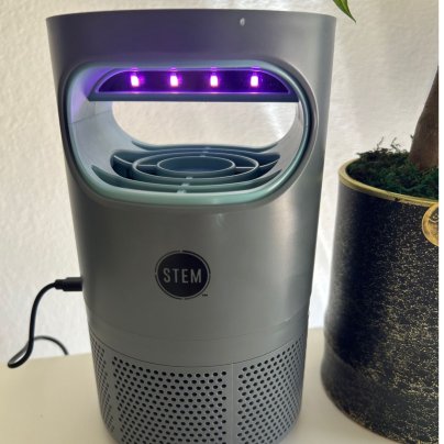 The Stem Flying Insects Fan Trap on side table during testing