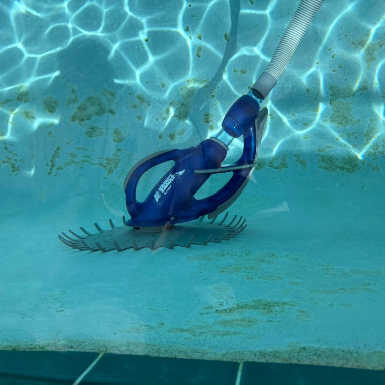 The Pentair Kreepy Krauly Suction-Side Pool Cleaner cleaning a pool during testing