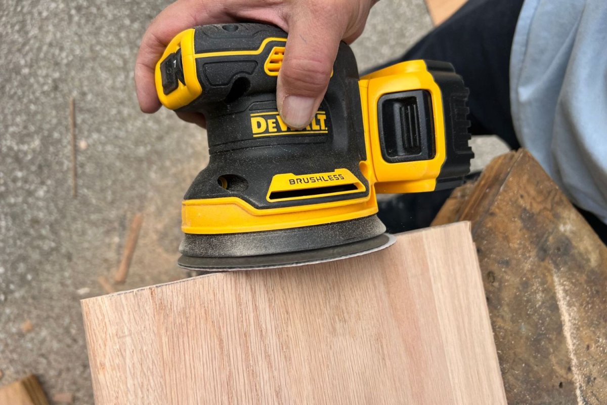 a person using one of the options of 7-Tool DeWalt Combo Kit