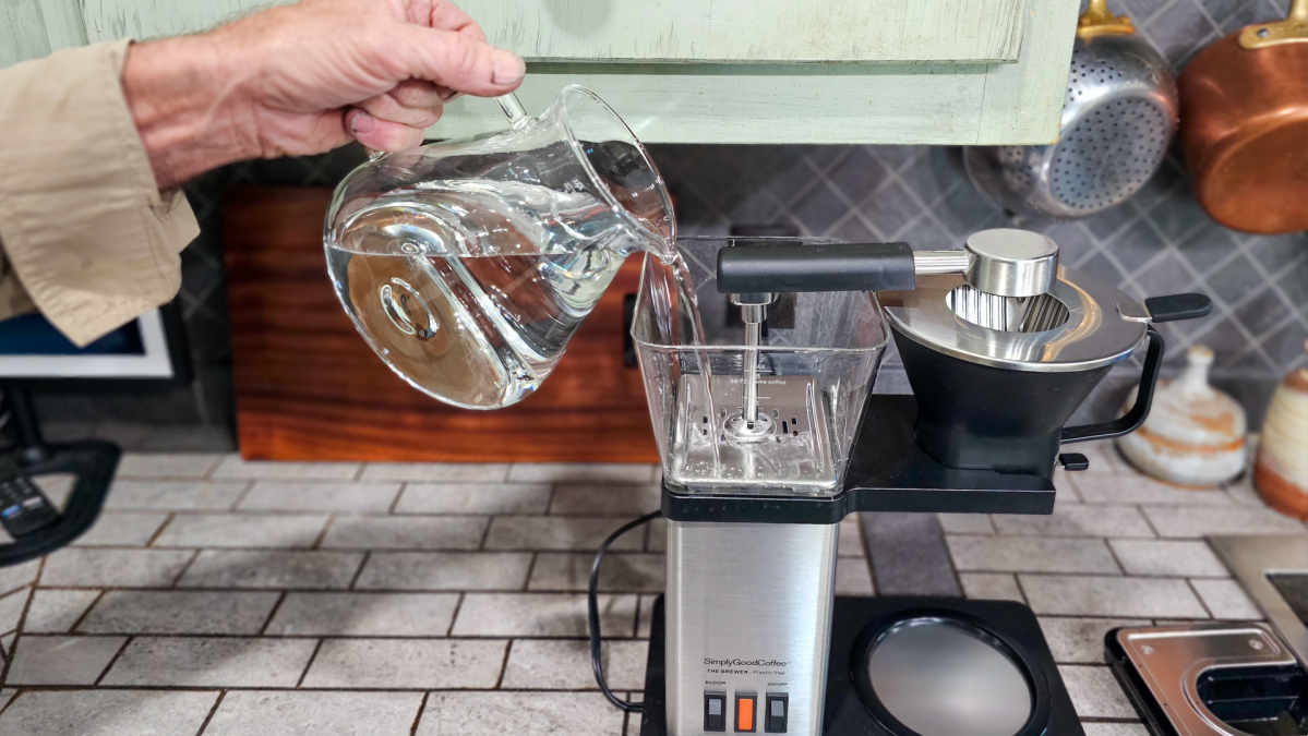 Adding water to the SimplyGoodCoffee resevoir