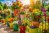 Vibrant summer flowers in colorful pots and planters adorn a sunny balcony or terrace.