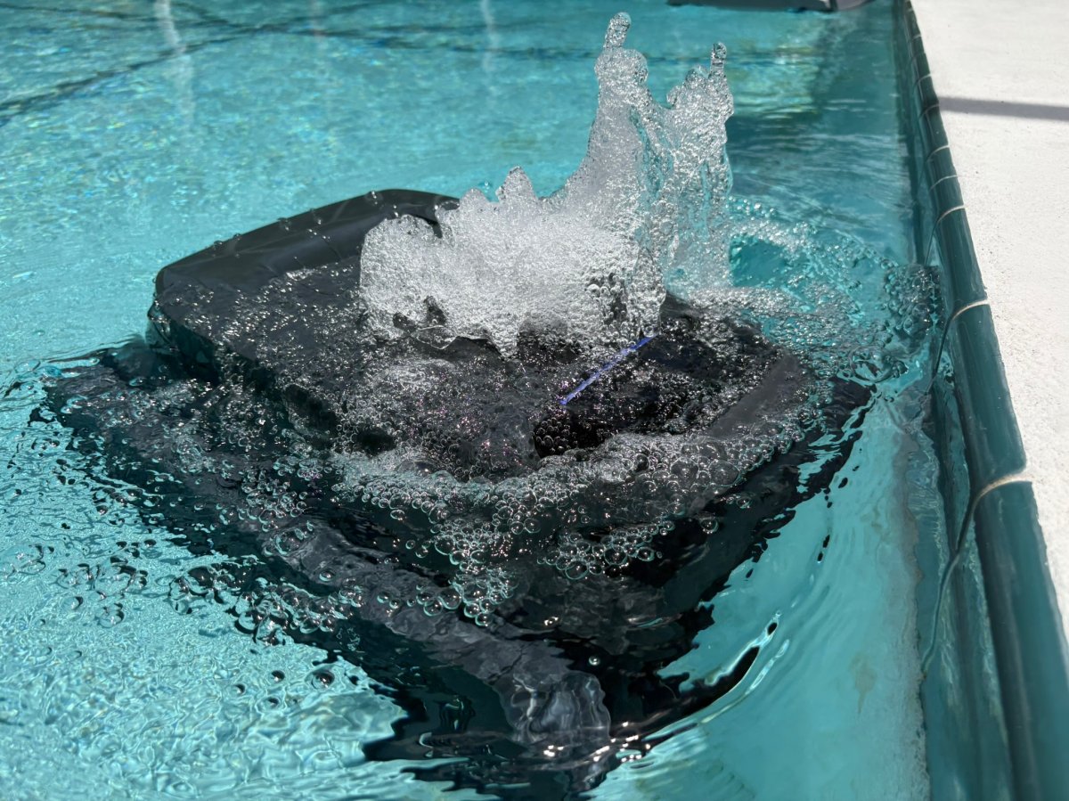 The Gosvor LiteVac G1 Pool Vacuum cleaning a pool during testing 