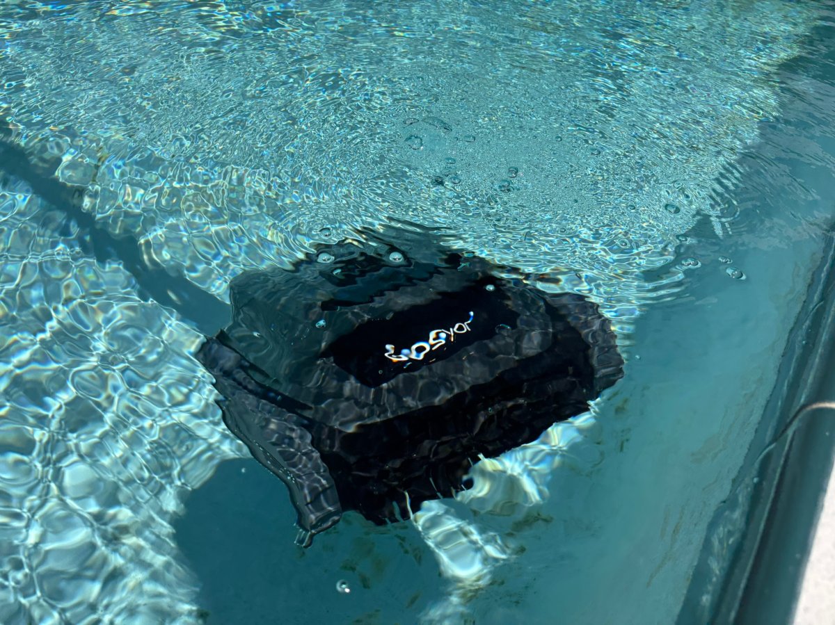 The Gosvor LiteVac G1 Pool Vacuum under the surface of the water during testing 