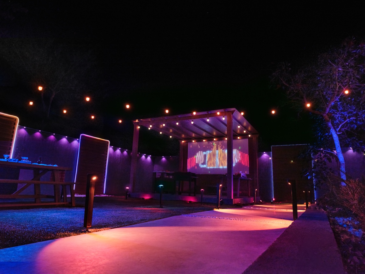 Govee outdoor string lights and lightwall in a backyard at night.