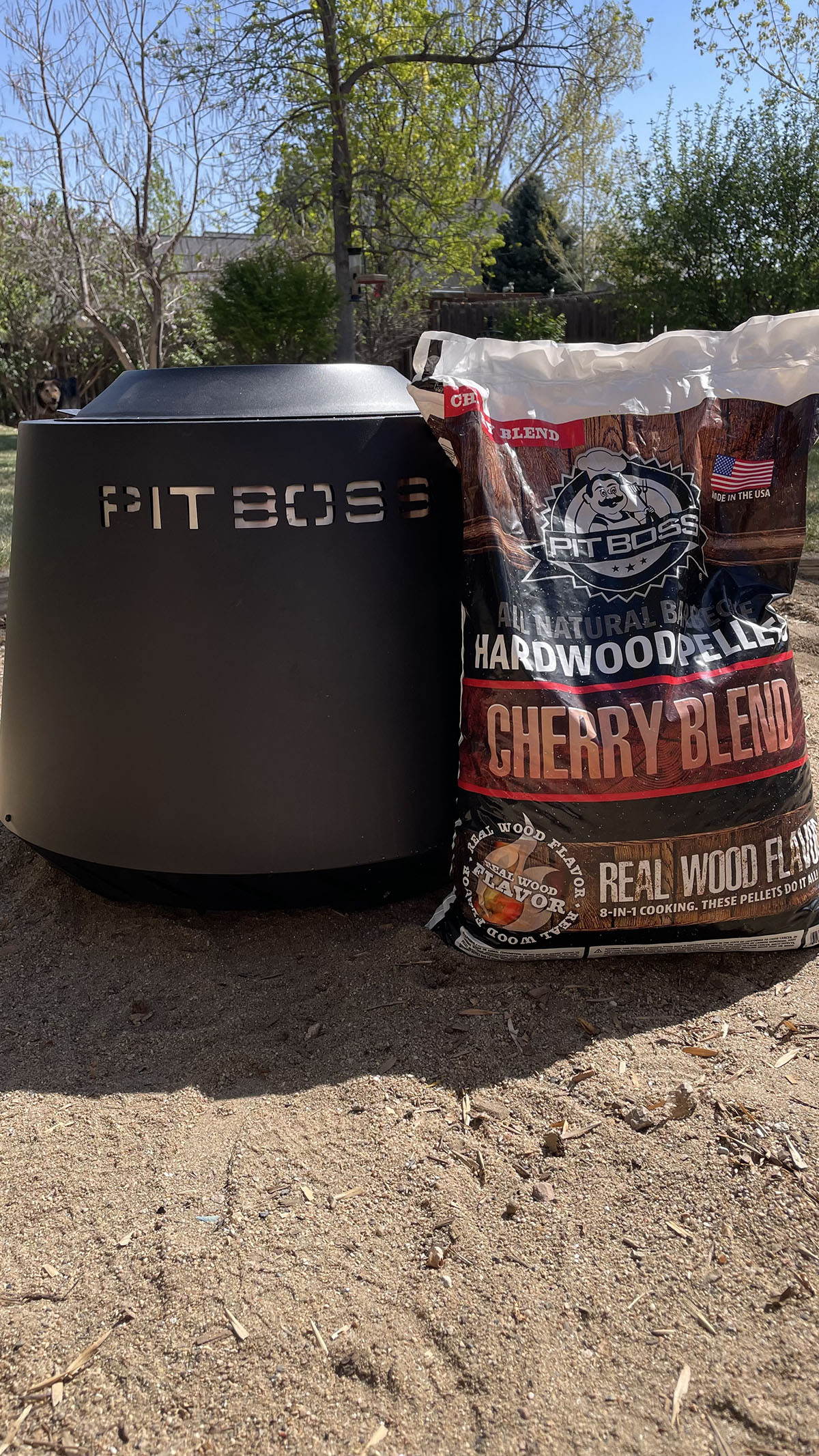 Pit Boss Smokeless Fire Pit with a bag of pellets