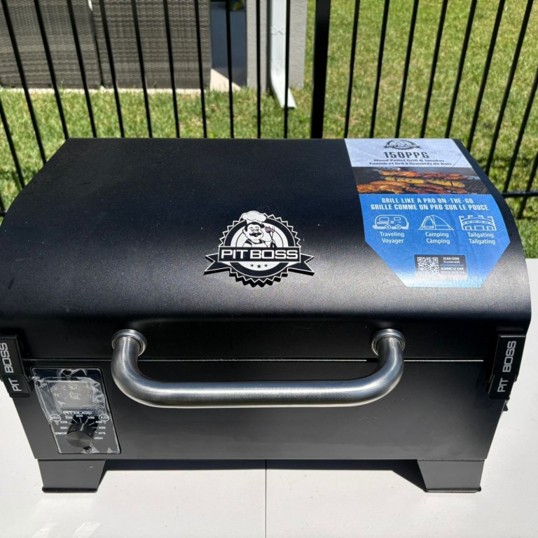 The Pit Boss Table Top Wood Pellet Grill on a patio before testing