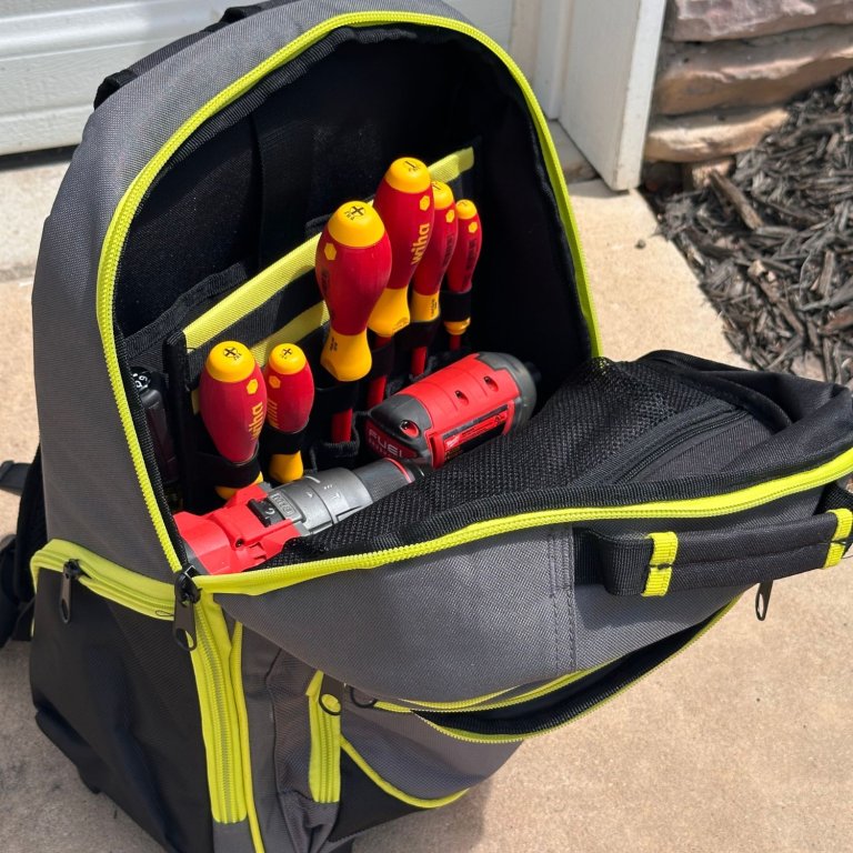 The Ryobi 16-inch Tool Backpack open to show it's full of tools during testing