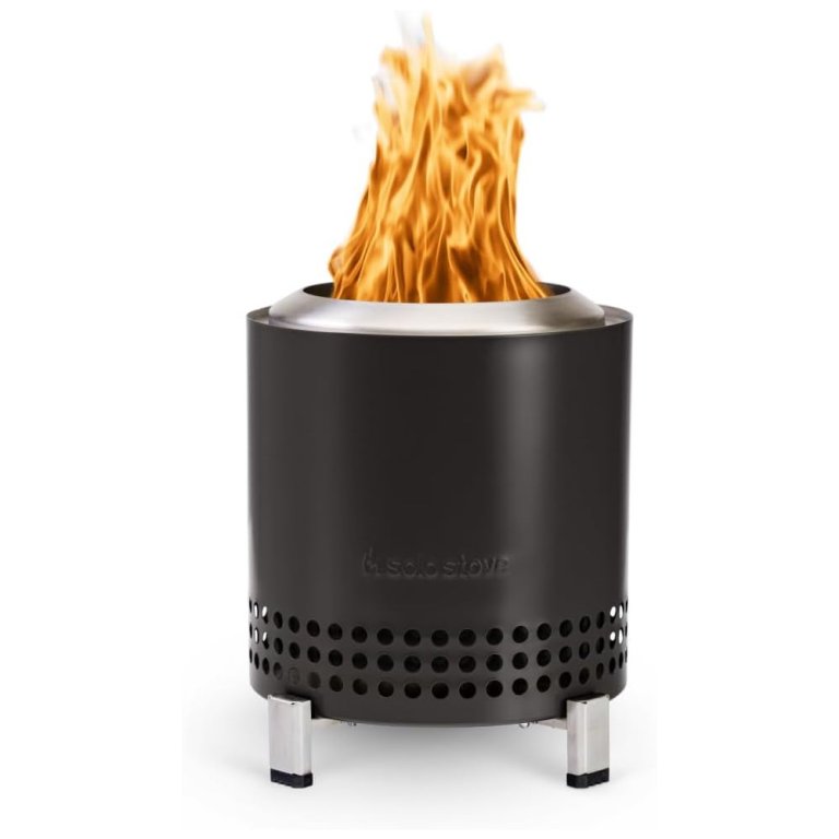 The Solo Stove Mesa XL Tabletop Fire Pit burning a fire while shown on a white background