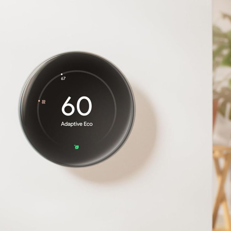 The Google Nest installed on a wall and set to 60 degrees Fahrenheit