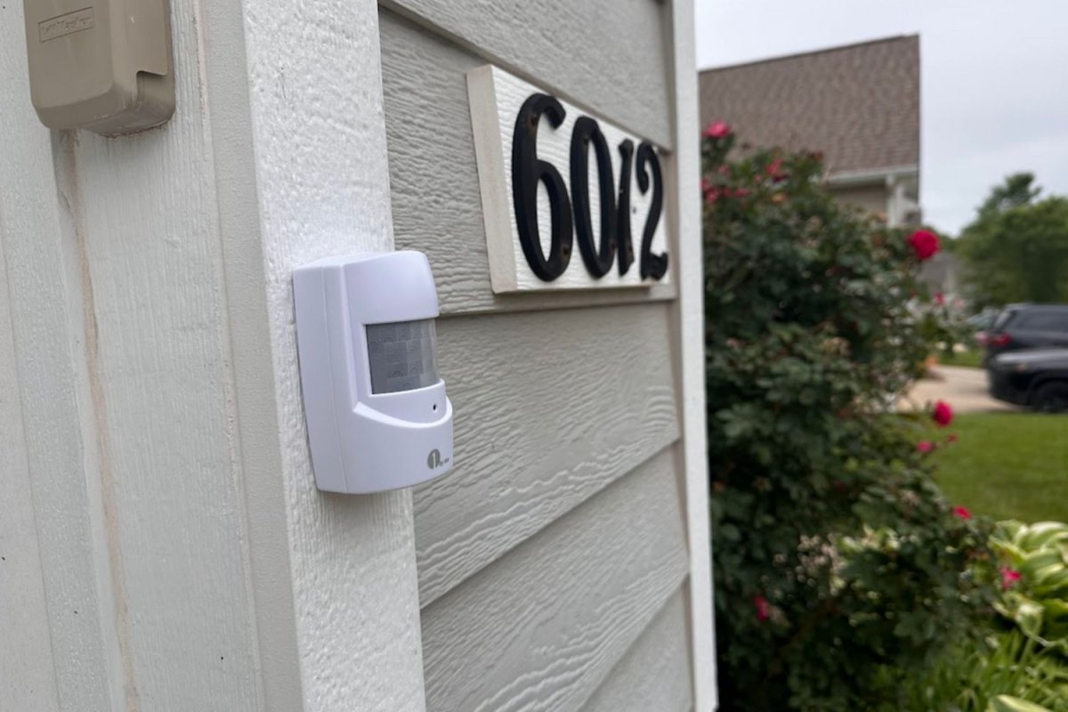 The 1byone Home Security Alert mounted to a house for testing