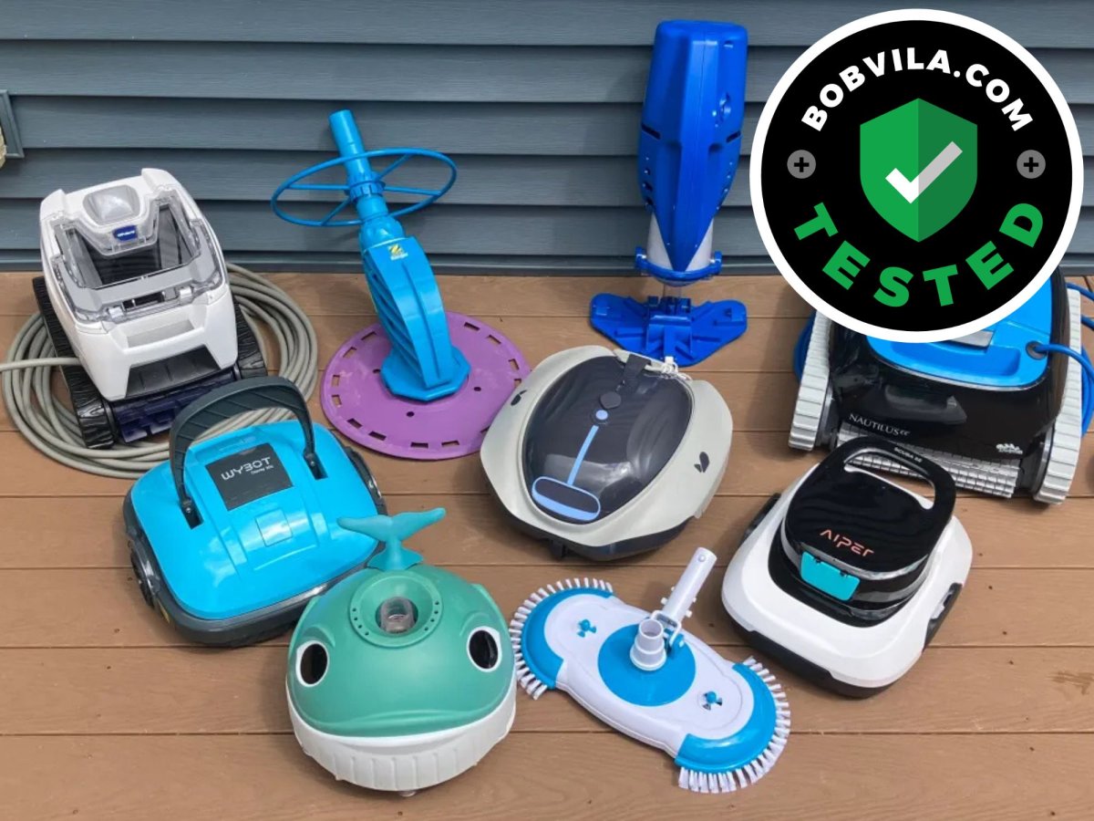 A group of the best above-ground pool vacuums together on a pool deck before testing