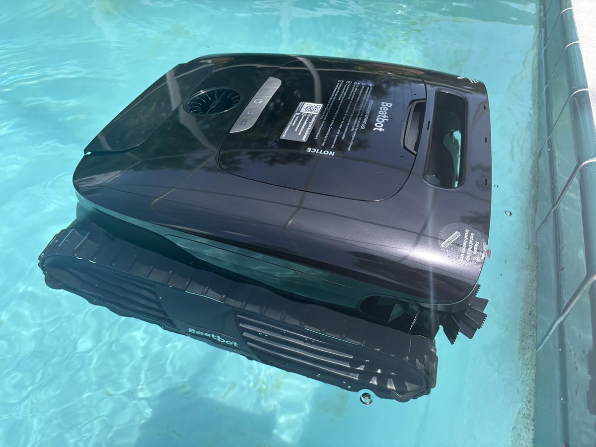The Beatbot AquaSense X skimming the surface of the water during testing