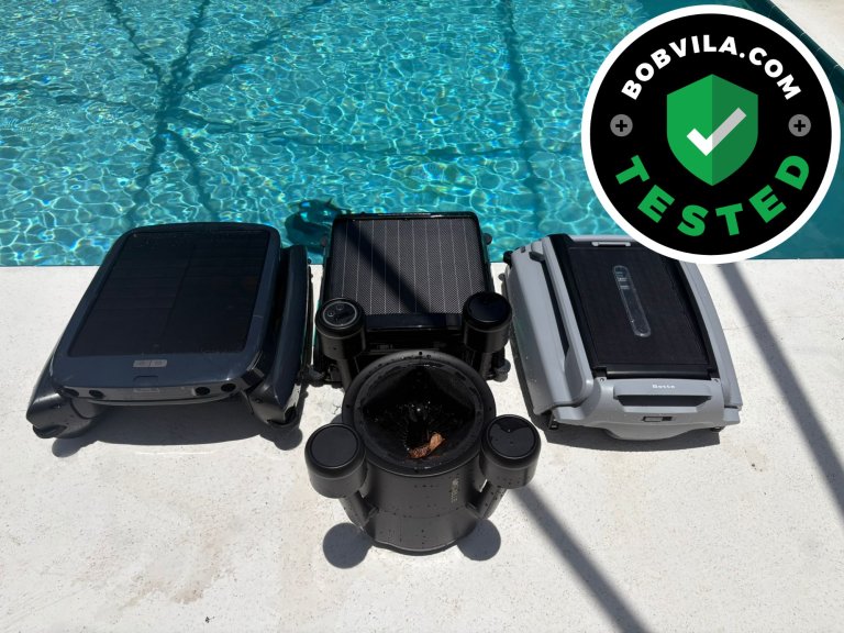 A group of the best robotic pool skimmers together on a pool deck before testing