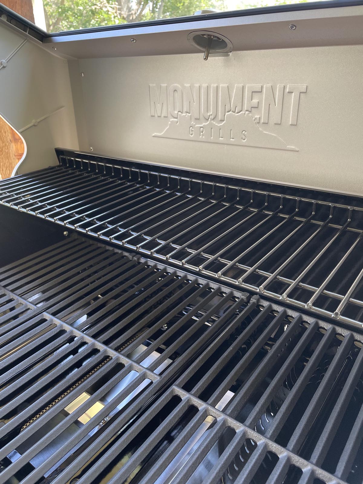 Cast iron grates and warming rack on Monument Grills Mesa 415BZ Propane Gas Grill