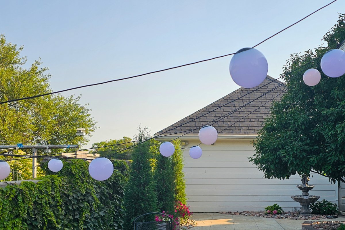 Daytime image of the Enbrighten Shpere lights installed in a yard during testing