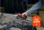 Milwaukee's M12 12V Lithium-Ion Cordless 3/8 in. Ratchet in use in a garage workshop, now free with qualifying purchase at Home Depot