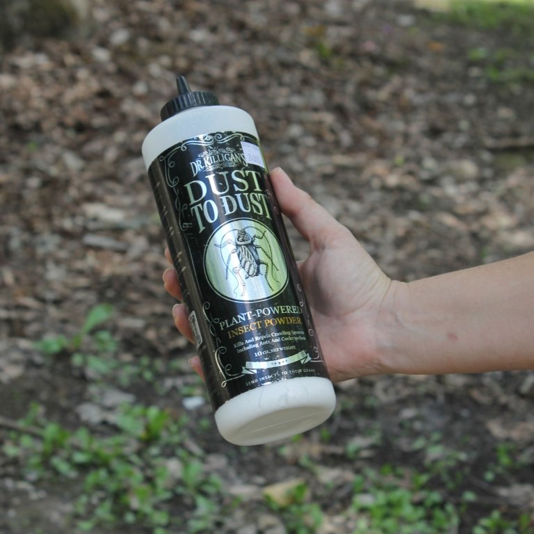 A person holding a bottle Dr. Killigan's in their hand during testing