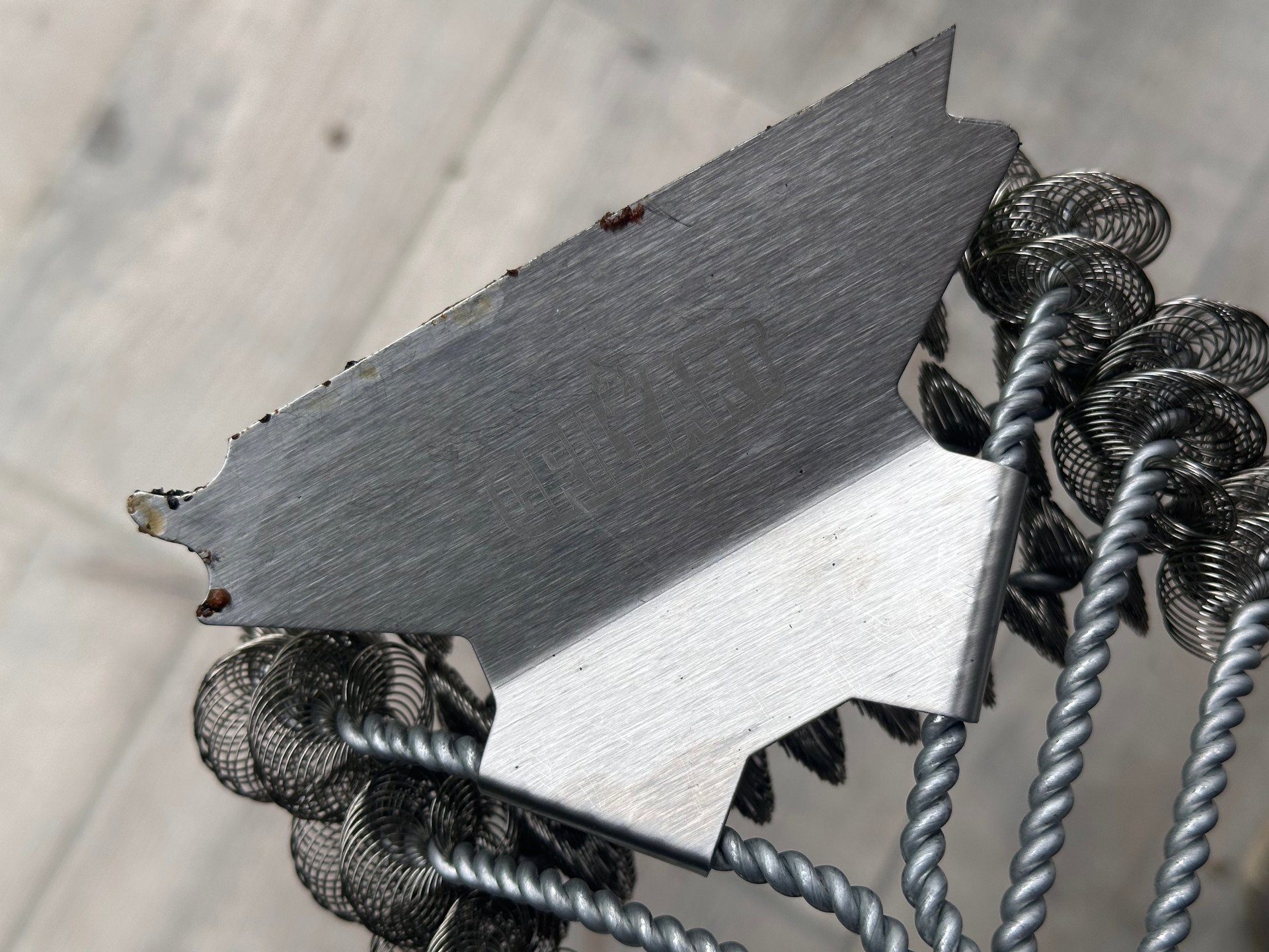 Scraper side of the GrillArt Bristle-Free 17-Inch Brush and Scraper