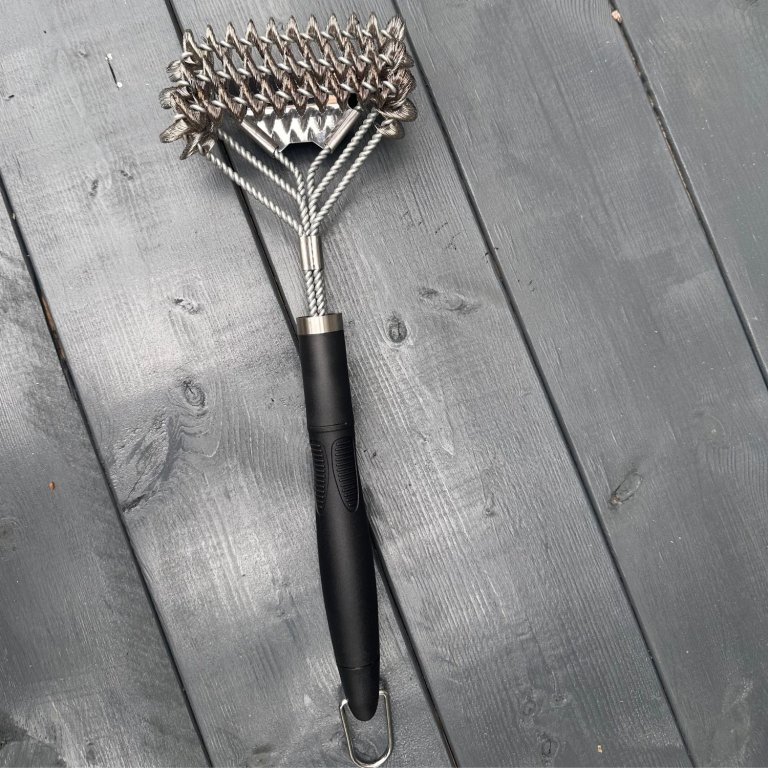 The GrillArt Bristle-Free 17-Inch Brush and Scraper on a table before testing