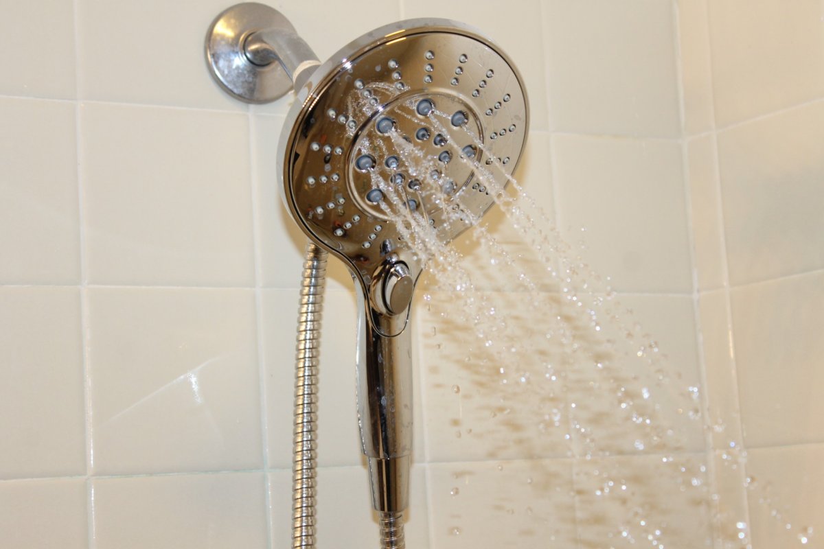 Moen Engage shower head with water on