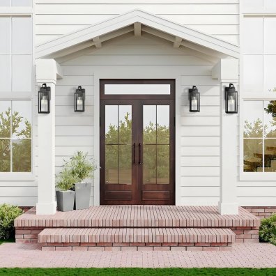 A front door flanked by four Pia Ricco Yorand Outdoor Lanterns, which are a gorgeous way to update your home's curb appeal