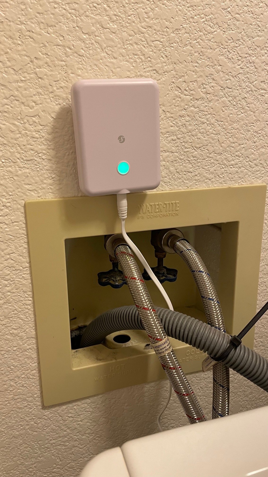 Shelly Flood Gen4 Smart Water Leak Detector near water valves