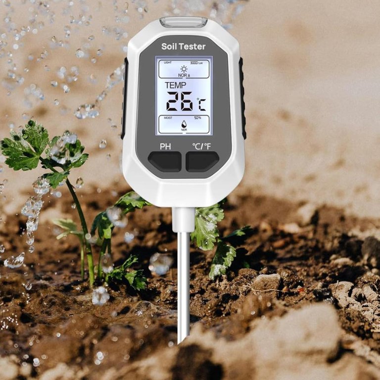 The Yamron 4-in-1 Soil Moisture Meter inserted in soil with several drops of water going over it