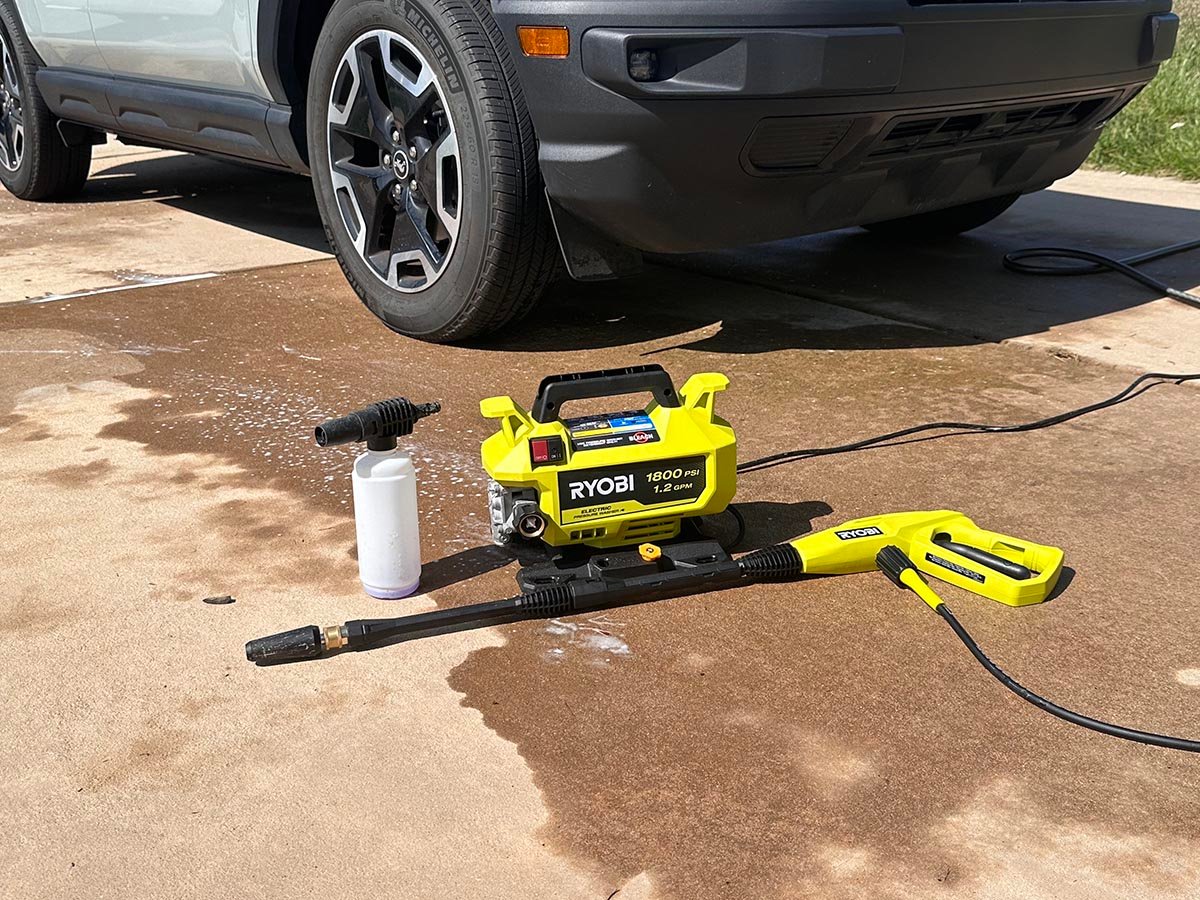 One of the best ryobi pressure washers on a driveway during testing