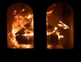 Roaring fire behind two panes of glass.