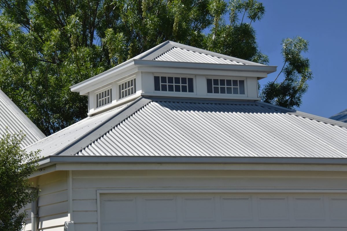 House with a light-colored roof.