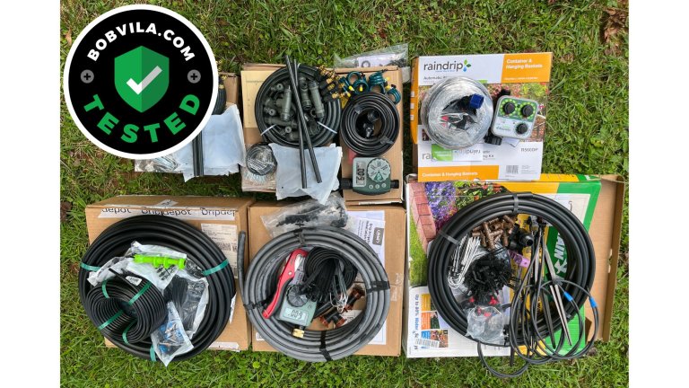 A group of the best drip irrigation systems with their packaging on a green lawn