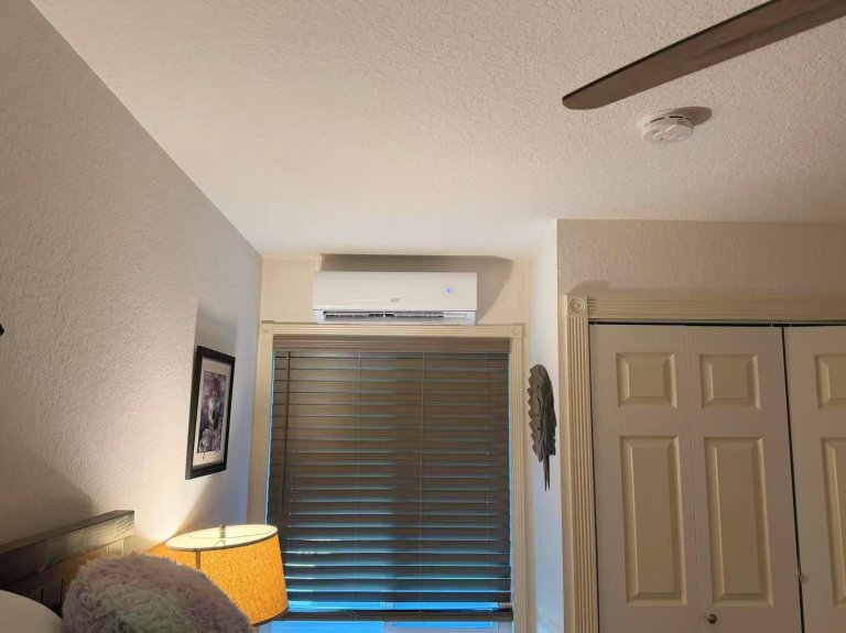 Costway Mini Split HVAC Installed Above a Bedroom Window