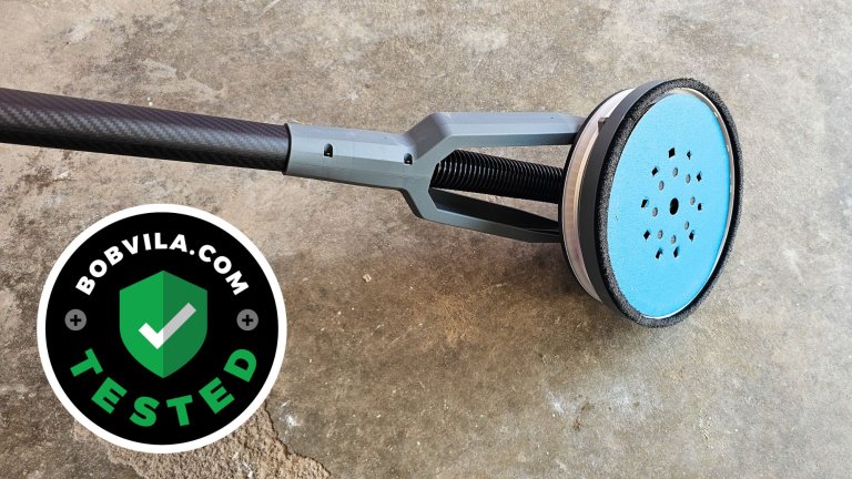 The Flex Cordless Drywall Sander on a cement floor during testing