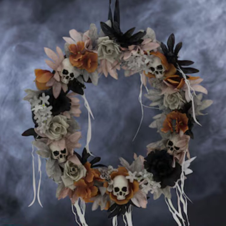 The Haunted Hill Farm Gothic Skull Wreath with Multicolor Flowers on a foggy background