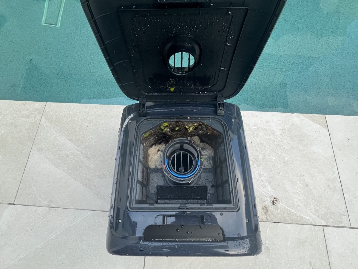 Inside of Beatbot Sora 70 pool cleaner after collecting debris from pool