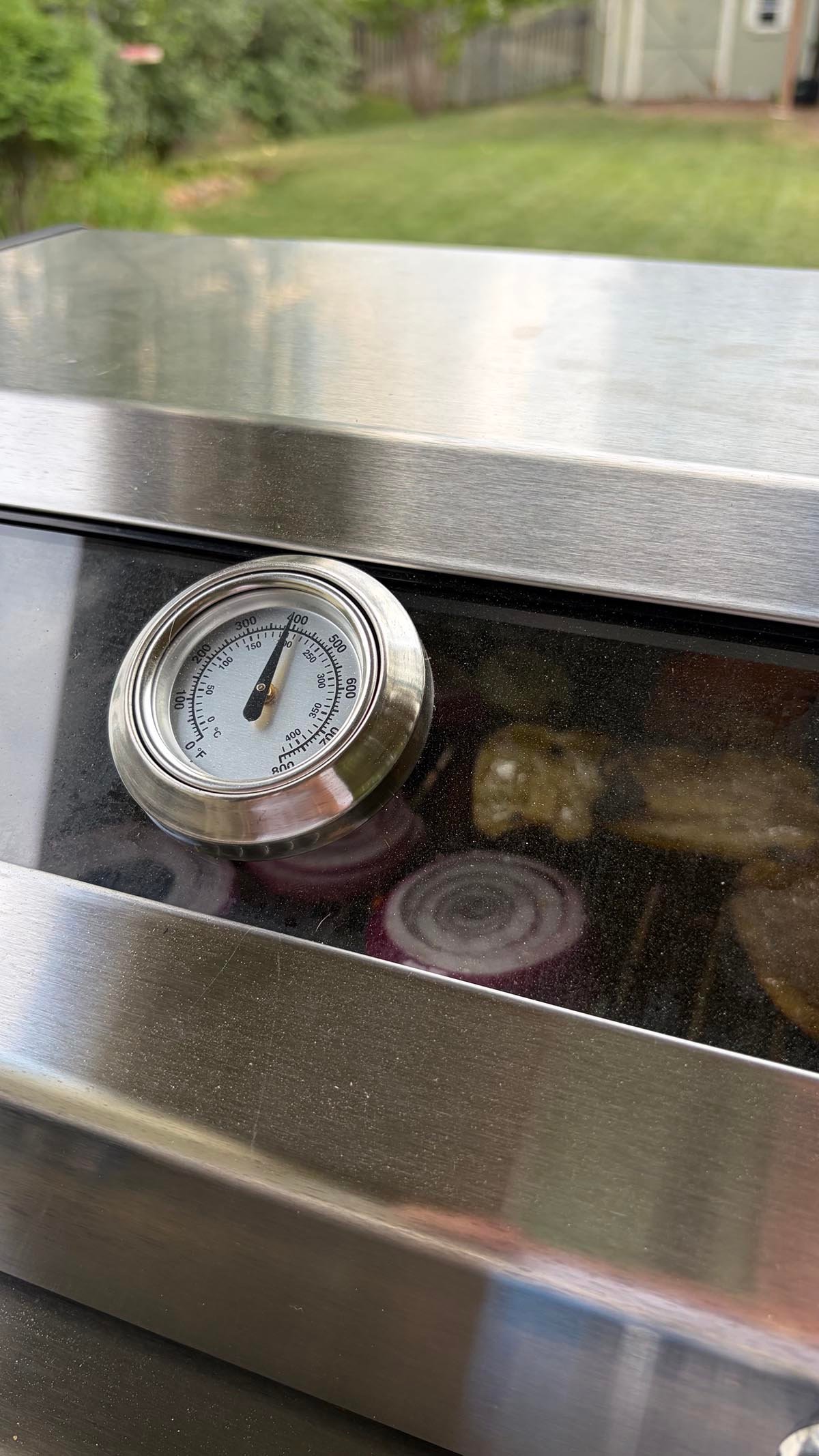 Monument Grills G22 Stainless Tabletop Propane Grill viewing window and built-in thermometer