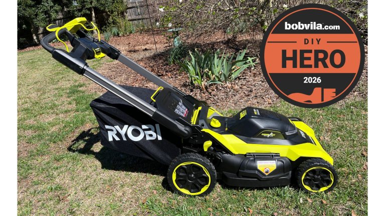 The Ryobi 40V HP 21-Inch AWD Lawn Mower in a yard before testing