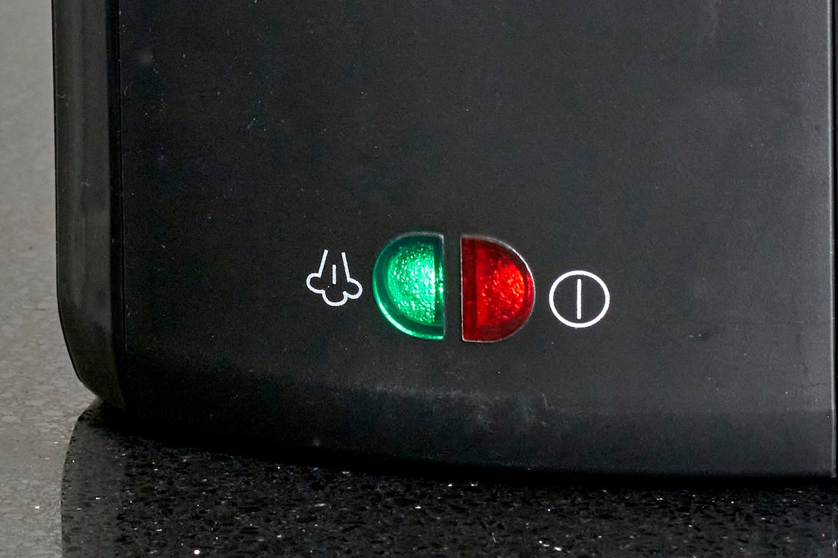 Green and red lights on a steamer are illuminated.