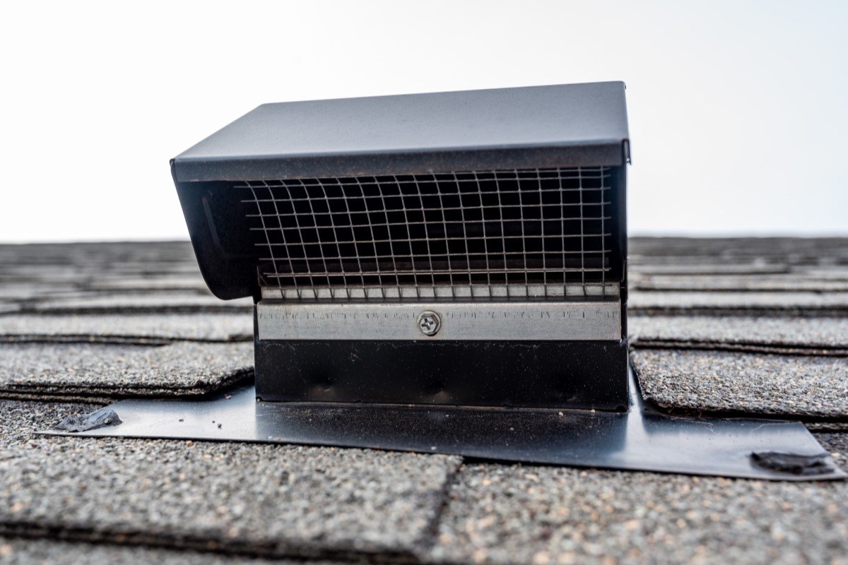 Static vent installed on a shingle roof for passive attic ventilation.
